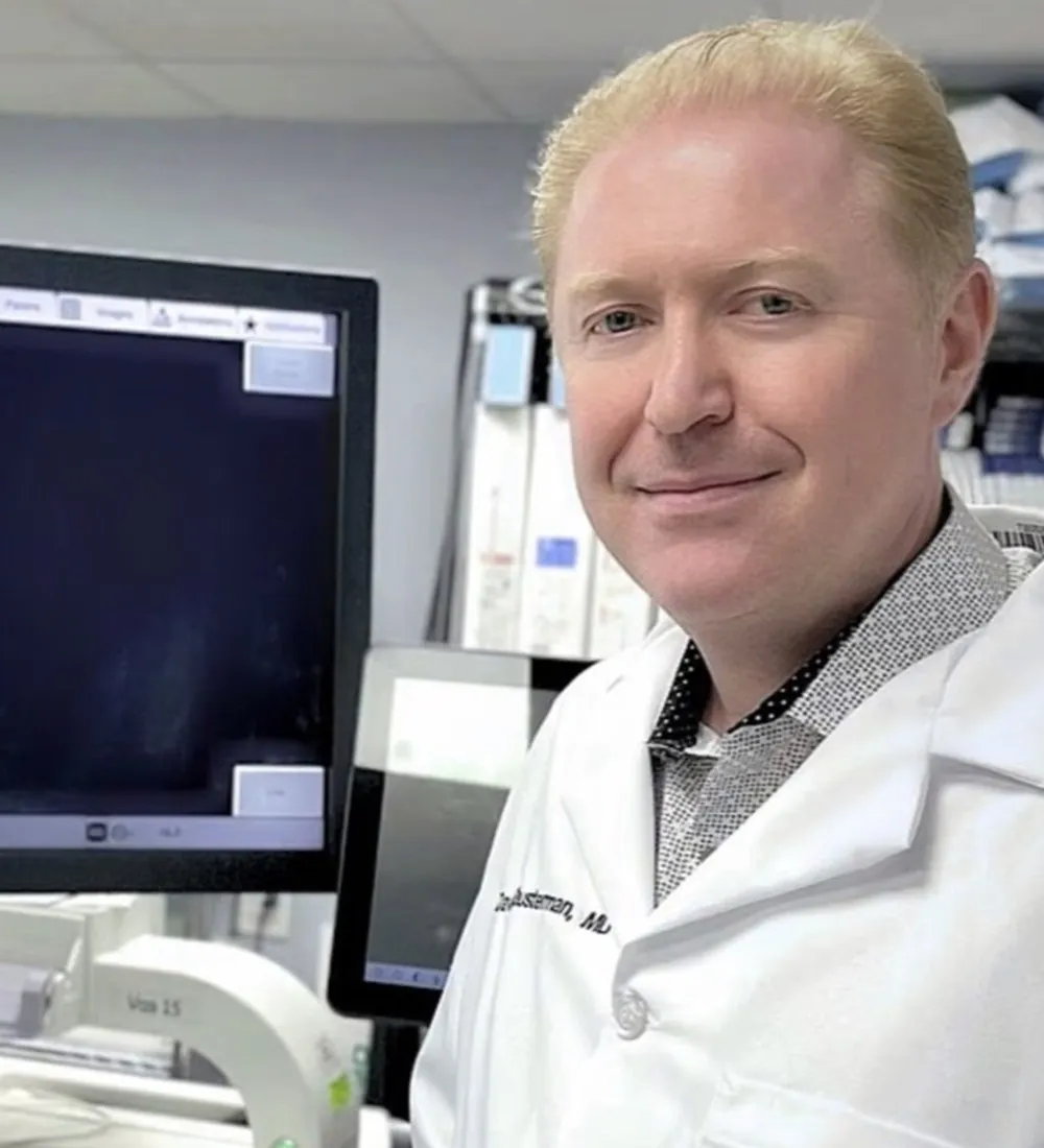Dr. David Shusterman in his clinical office